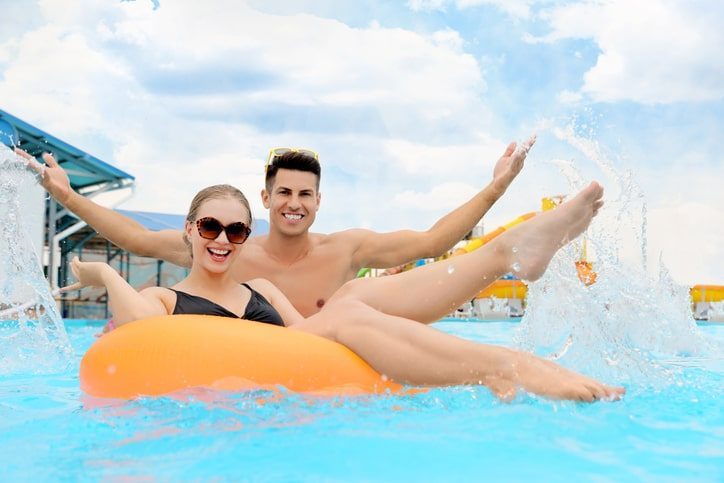 A couple enjoying a splash park in Garland, TX.