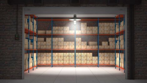 a large, open storage unit lined with shelves full of organized boxes