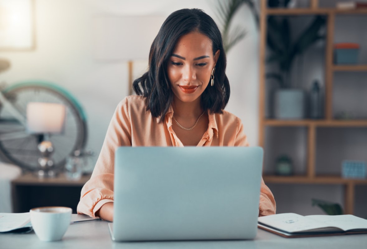 Woman researching on laptop