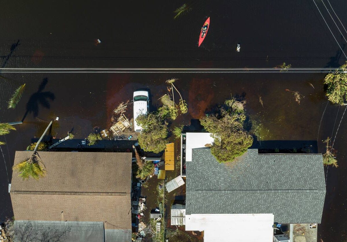 An overhead view of hurricane aftermath in a residential area.