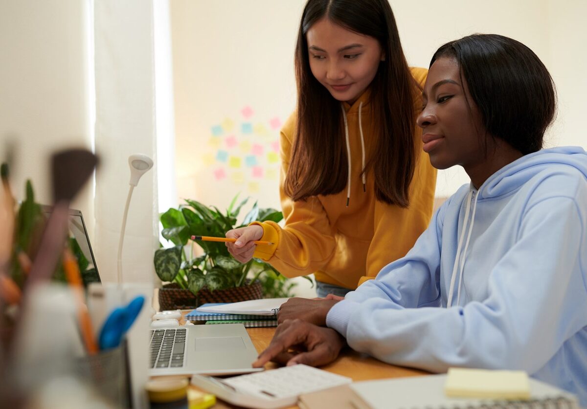 Students studying together inside the dorm.