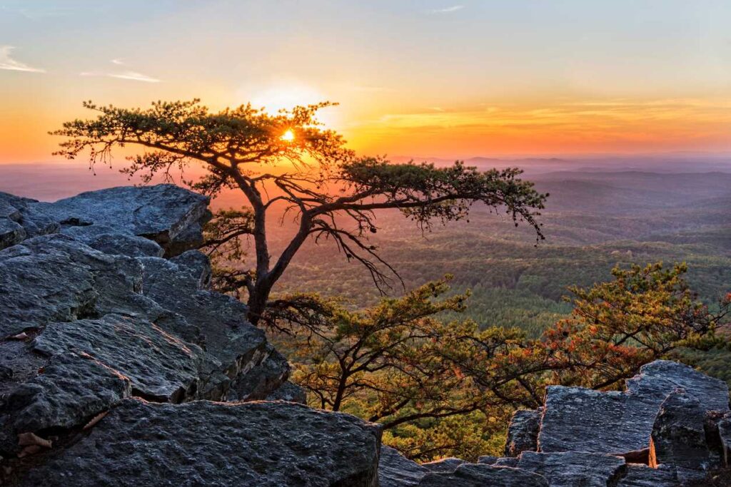 An overlook view of a sunset at Cheaha State Park. 